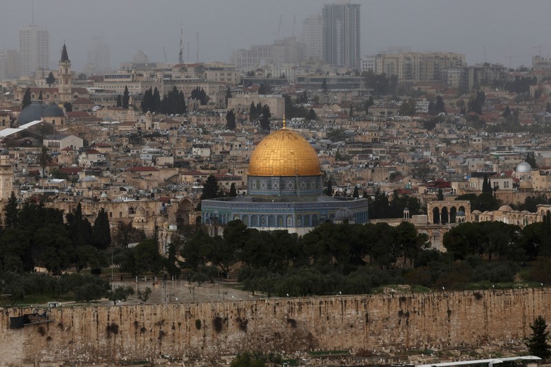 1251745716 A picture shows a view of the al-Aqsa mosque complex and its Dome of the Rock mosque in Jerusalem on a rainy day, on April 12, 2023. (Photo by AHMAD GHARABLI / AFP) (Photo by AHMAD GHARABLI/AFP via Getty Images)