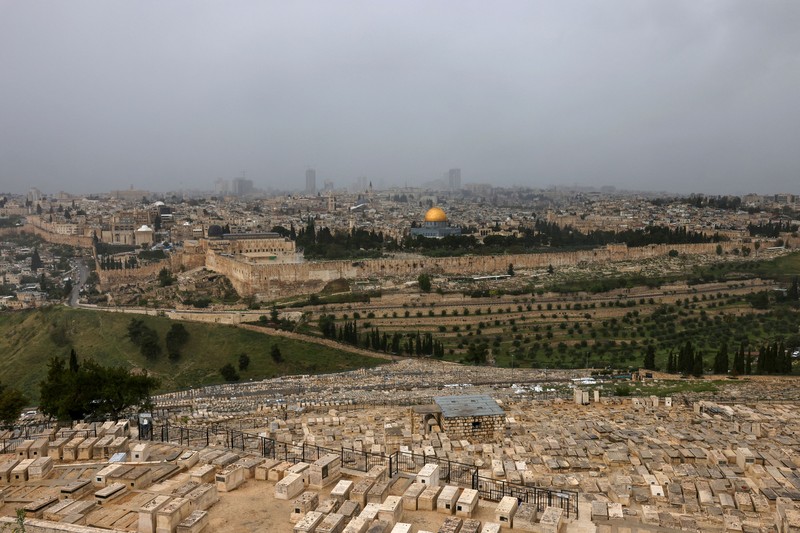 1251745716 A picture shows a view of the al-Aqsa mosque complex and its Dome of the Rock mosque in Jerusalem on a rainy day, on April 12, 2023. (Photo by AHMAD GHARABLI / AFP) (Photo by AHMAD GHARABLI/AFP via Getty Images)
