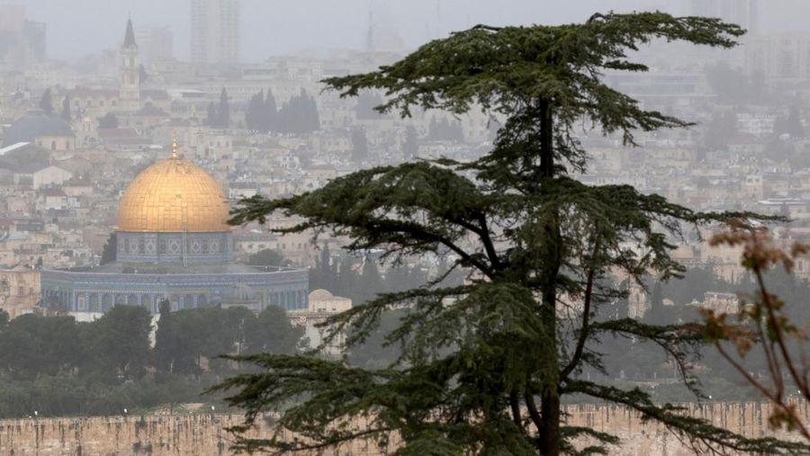 A picture shows a view of the al-Aqsa mosque complex and its Dome of the Rock mosque in Jerusalem on a rainy day, on April 12, 2023. (Photo by AHMAD GHARABLI / AFP) (Photo by AHMAD GHARABLI/AFP via Getty Images)