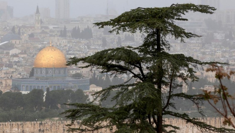 A picture shows a view of the al-Aqsa mosque complex and its Dome of the Rock mosque in Jerusalem on a rainy day, on April 12, 2023. (Photo by AHMAD GHARABLI / AFP) (Photo by AHMAD GHARABLI/AFP via Getty Images)