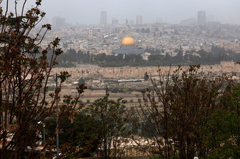 A picture shows a view of the al-Aqsa mosque complex and its Dome of the Rock mosque in Jerusalem on a rainy day, on April 12, 2023. (Photo by AHMAD GHARABLI / AFP) (Photo by AHMAD GHARABLI/AFP via Getty Images)