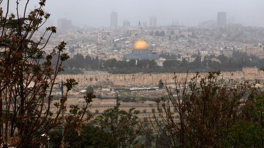A picture shows a view of the al-Aqsa mosque complex and its Dome of the Rock mosque in Jerusalem on a rainy day, on April 12, 2023. (Photo by AHMAD GHARABLI / AFP) (Photo by AHMAD GHARABLI/AFP via Getty Images)