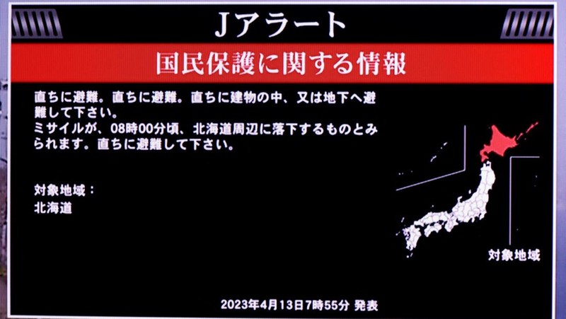 A TV screen displays a warning message called 