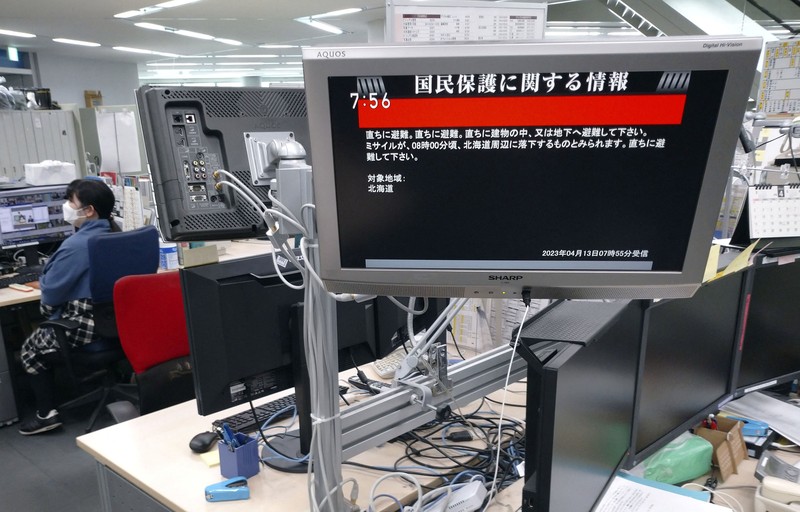 NORTHKOREA-MISSILES/JAPAN A TV screen displays a warning message called