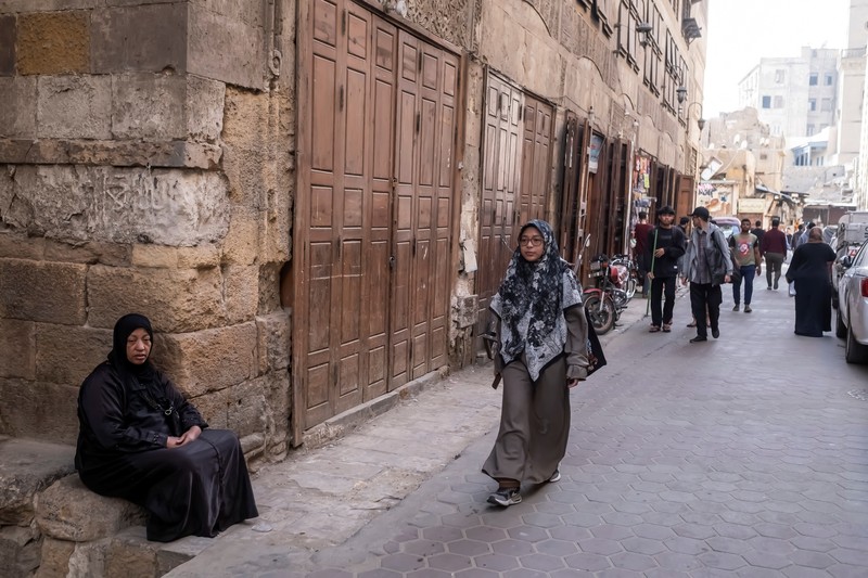 Indonesian student Nuni Nuraini Ahyani, 25, leaves the house to give a lesson on Hadith for new students during the holy month of Ramadan, after her day studying Usul al-Din with a specialization in Hadith at Al-Azhar University in old Islamic Cairo, Egypt April 4, 2023. REUTERS/Fatma Fahmy