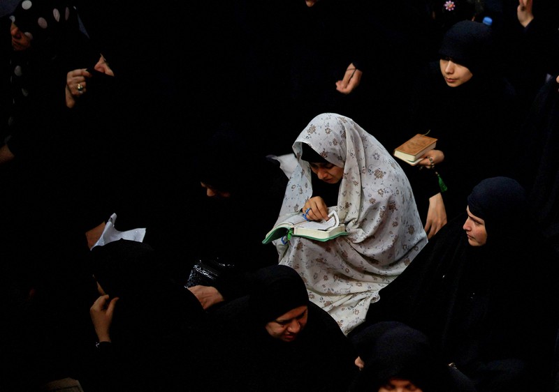 General view of muslims performing evening prayers at the Grand Mosque during the holy month of Ramadan, in the holy city of Mecca, Saudi Arabia, April 11, 2023. Saudi Press Agency/Handout via REUTERS ATTENTION EDITORS - THIS PICTURE WAS PROVIDED BY A THIRD PARTY