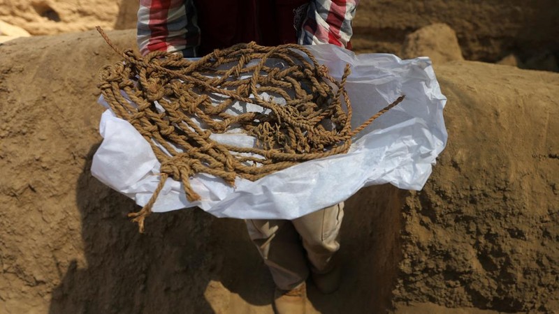 Archaeologists work at the archaeological complex of Cajamarquilla where pre-Inca mummies from 900 to 1200 years old were discovered,  in Lima, Peru April 24, 2023. REUTERS/Sebastian Castaneda