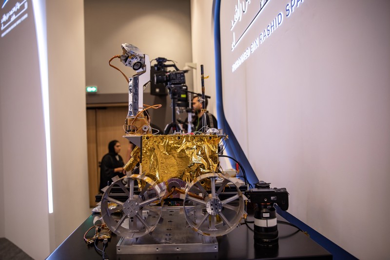 1252172990 DUBAI, UNITED ARAB EMIRATES - APRIL 25: A copy of the Emirati-made Rashid Rover in the command center of the Mohammed Bin Rashid Space Centre on April 25, 2023 in Dubai, United Arab Emirates. The Rashid Rover would have been the first Arab-made spacecraft to land on the surface of the Moon, but the landing of the spacecraft carrying the Rover was unsuccessful. (Photo by Andrea DiCenzo/Getty Images)