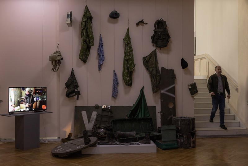 1252211004 KYIV, UKRAINE - APRIL 26: A man walks down the steps next to exhibited items of the Russian army on April 26, 2023 at the National Museum of the History of Ukraine in Kyiv, Ukraine. Museum curators retrieved a variety of items left by Russian soldiers during the first part of their 2022 invasion, when Russian forces occupied areas around Kyiv. Russia ultimately retreated from around the capital, concentrating its land war in the east. (Photo by Roman Pilipey/Getty Images)