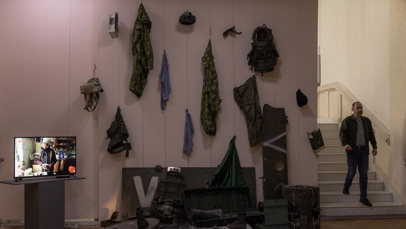 KYIV, UKRAINE - APRIL 26: A man walks down the steps next to exhibited items of the Russian army on April 26, 2023 at the National Museum of the History of Ukraine in Kyiv, Ukraine. Museum curators retrieved a variety of items left by Russian soldiers during the first part of their 2022 invasion, when Russian forces occupied areas around Kyiv. Russia ultimately retreated from around the capital, concentrating its land war in the east. (Photo by Roman Pilipey/Getty Images)