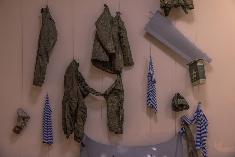 KYIV, UKRAINE - APRIL 26: A man walks down the steps next to exhibited items of the Russian army on April 26, 2023 at the National Museum of the History of Ukraine in Kyiv, Ukraine. Museum curators retrieved a variety of items left by Russian soldiers during the first part of their 2022 invasion, when Russian forces occupied areas around Kyiv. Russia ultimately retreated from around the capital, concentrating its land war in the east. (Photo by Roman Pilipey/Getty Images)