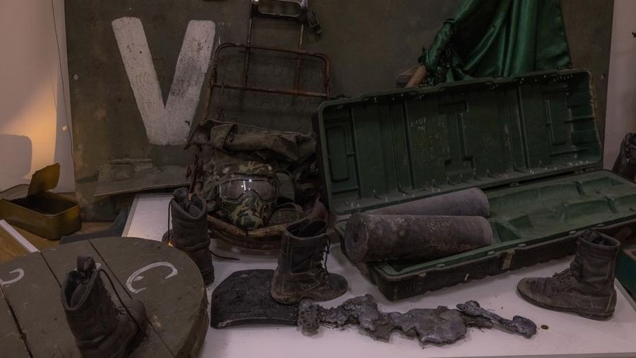 KYIV, UKRAINE - APRIL 26: A man walks down the steps next to exhibited items of the Russian army on April 26, 2023 at the National Museum of the History of Ukraine in Kyiv, Ukraine. Museum curators retrieved a variety of items left by Russian soldiers during the first part of their 2022 invasion, when Russian forces occupied areas around Kyiv. Russia ultimately retreated from around the capital, concentrating its land war in the east. (Photo by Roman Pilipey/Getty Images)