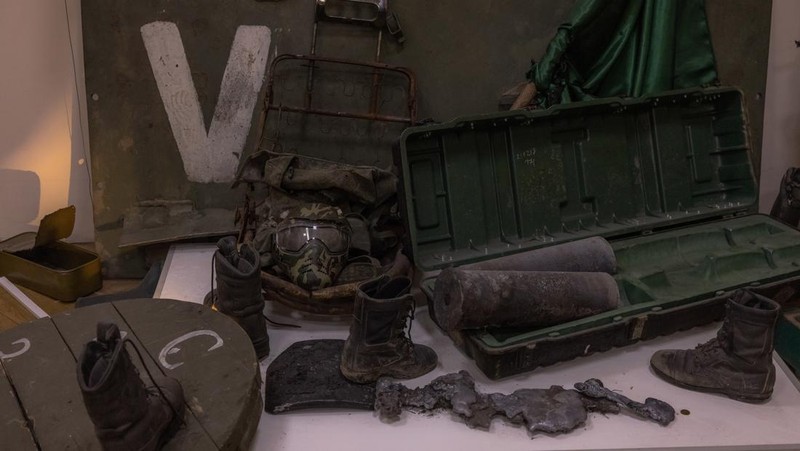 KYIV, UKRAINE - APRIL 26: A man walks down the steps next to exhibited items of the Russian army on April 26, 2023 at the National Museum of the History of Ukraine in Kyiv, Ukraine. Museum curators retrieved a variety of items left by Russian soldiers during the first part of their 2022 invasion, when Russian forces occupied areas around Kyiv. Russia ultimately retreated from around the capital, concentrating its land war in the east. (Photo by Roman Pilipey/Getty Images)