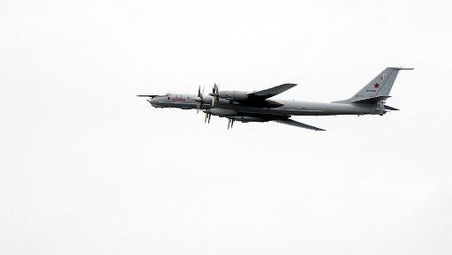 A Russian Tupolev TU-142 flies by the USS Mount Whitney of the US Navy during the NATO-led military exercise Trident Juncture on November 2, 2018 at the Norwegian sea outside Trondheim, Norway - Trident Juncture 2018, is a NATO-led military exercise held in Norway from 25 October to 7 November 2018. The exercise is the largest of its kind in Norway since the 1980s. Around 50,000 participants from NATO and partner countries, some 250 aircraft, 65 ships and up to 10,000 vehicles take part in the exercise. The main goal of Trident Juncture is allegedly to train the NATO Response Force and to test the alliance's defence capability. (Photo by Jonathan NACKSTRAND / AFP)
