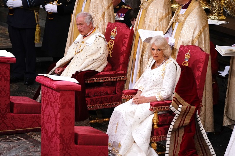Raja Charles III dan Putri Camilia berada di dalam kereta kuda menjelang penobatan di London, Inggris, Sabtu, (6/5/2023). Raja Charles III dan Putri Camilia berada di dalam kereta kuda menjelang penobatan di London, Inggris, Sabtu, (6/5/2023). (Christopher Furlong/Getty Images)