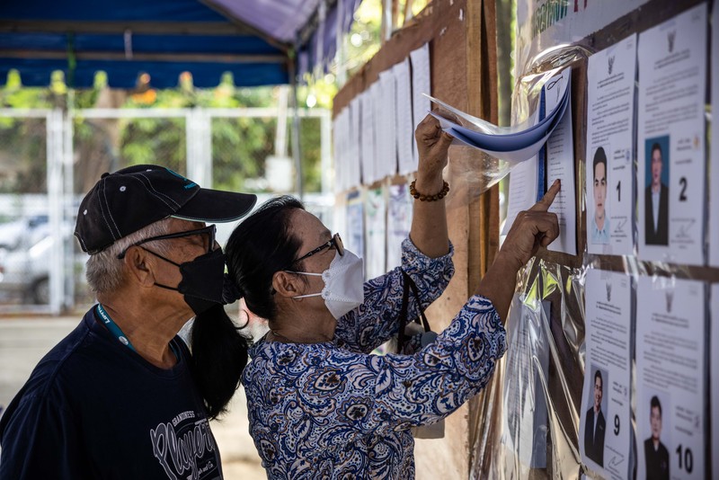 1254695302 Voters cast their ballots in the Khan Na Yao area in Bangkok, Thailand, on Sunday, May 14, 2023. A record number of Thais are projected to go to the ballot boxes in Sunday's parliamentary election as voters decide if they'll shift leadership away from almost a decade of military-backed rule. More than 50 million Thais are eligible to vote, and the Election Commission expects an 80% turnout. Photographer: Andre Malerba/Bloomberg via Getty Images