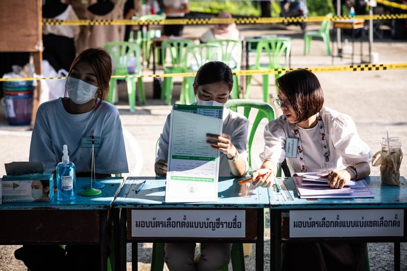 1254695302 Voters cast their ballots in the Khan Na Yao area in Bangkok, Thailand, on Sunday, May 14, 2023. A record number of Thais are projected to go to the ballot boxes in Sunday's parliamentary election as voters decide if they'll shift leadership away from almost a decade of military-backed rule. More than 50 million Thais are eligible to vote, and the Election Commission expects an 80% turnout. Photographer: Andre Malerba/Bloomberg via Getty Images