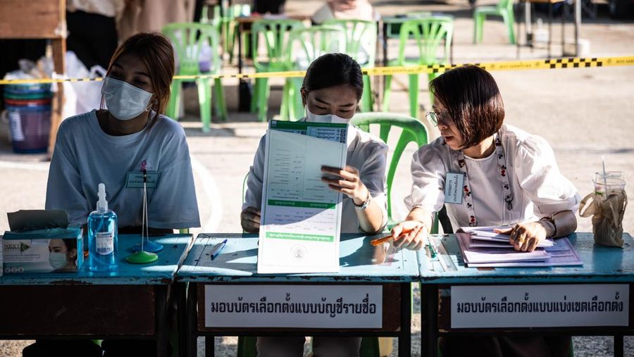 Voters cast their ballots in the Khan Na Yao area in Bangkok, Thailand, on Sunday, May 14, 2023. A record number of Thais are projected to go to the ballot boxes in Sunday's parliamentary election as voters decide if they'll shift leadership away from almost a decade of military-backed rule. More than 50 million Thais are eligible to vote, and the Election Commission expects an 80% turnout. Photographer: Andre Malerba/Bloomberg via Getty Images