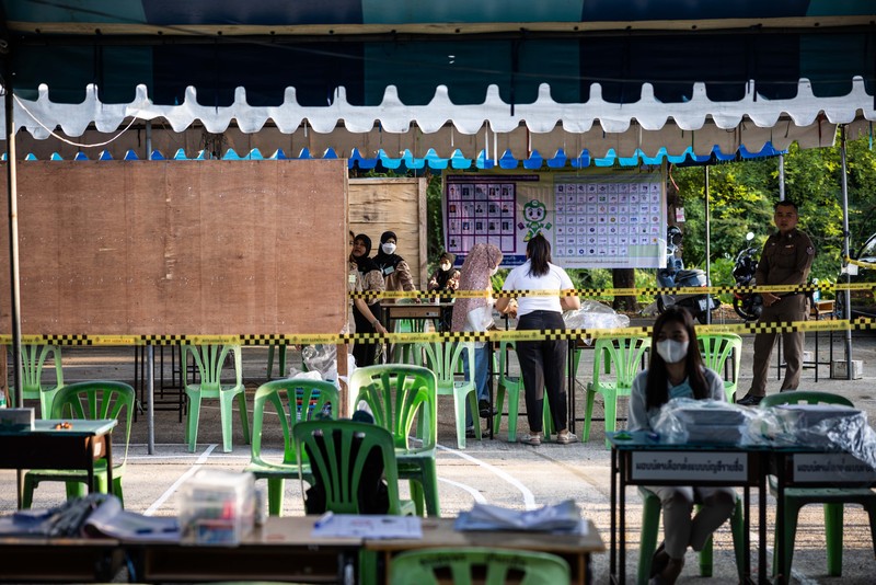 1254695302 Voters cast their ballots in the Khan Na Yao area in Bangkok, Thailand, on Sunday, May 14, 2023. A record number of Thais are projected to go to the ballot boxes in Sunday's parliamentary election as voters decide if they'll shift leadership away from almost a decade of military-backed rule. More than 50 million Thais are eligible to vote, and the Election Commission expects an 80% turnout. Photographer: Andre Malerba/Bloomberg via Getty Images