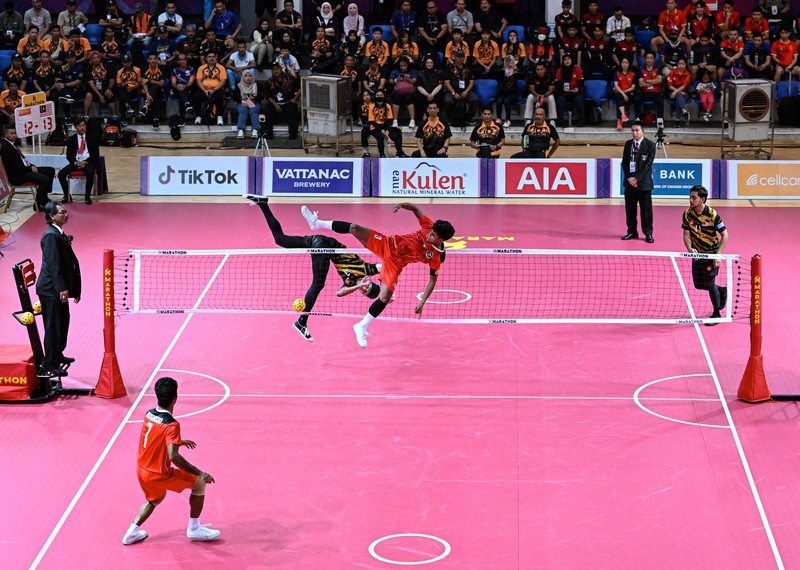 Malaysia's Muhammad Hafizul Hayazi Adnan (C-L) and Indonesia's Muhammad Hardiansyah (C) compete in their men's double sepak takraw final event during the 32nd Southeast Asian Games (SEA Games) in Phnom Penh on May 15, 2023. (Photo by MOHD RASFAN / AFP) (Photo by MOHD RASFAN/AFP via Getty Images)
