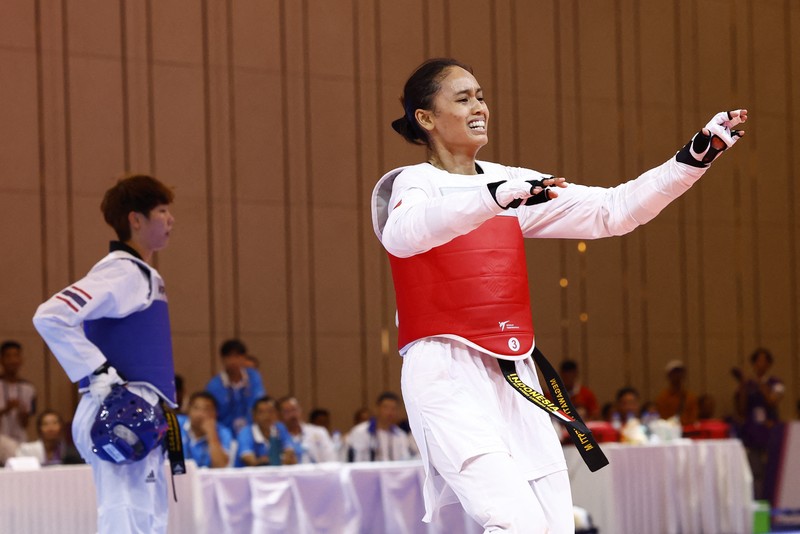 Chroy Changvar Convention Center Hall F, Phnom Penh, Kamboja - 15 Mei 2023 Tamesti Megawati dari Indonesia bereaksi selama putaran final. Chroy Changvar Convention Center Hall F, Phnom Penh, Kamboja - 15 Mei 2023 Tamesti Megawati dari Indonesia bereaksi selama putaran final. (REUTERS/Kim Kyung-Hoon)
