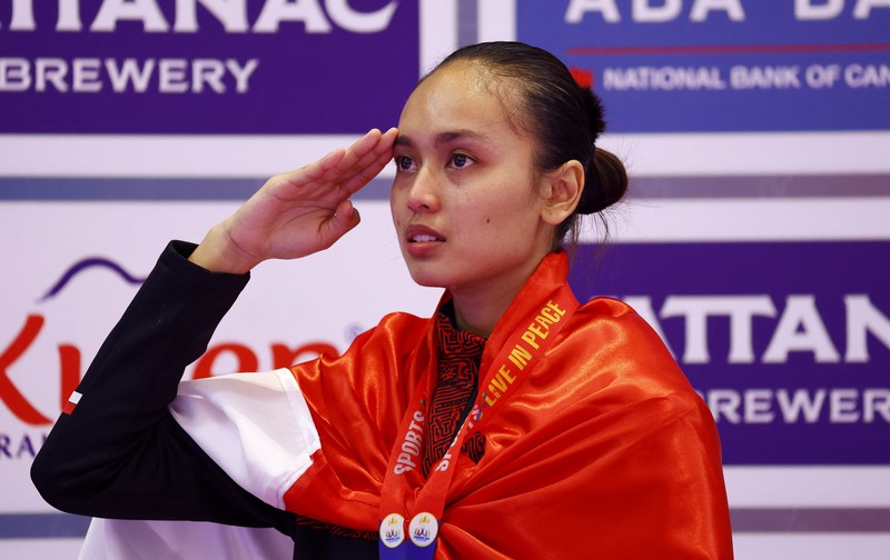 Chroy Changvar Convention Center Hall F, Phnom Penh, Kamboja - 15 Mei 2023 Tamesti Megawati dari Indonesia bereaksi selama putaran final. Chroy Changvar Convention Center Hall F, Phnom Penh, Kamboja - 15 Mei 2023 Tamesti Megawati dari Indonesia bereaksi selama putaran final. (REUTERS/Kim Kyung-Hoon)