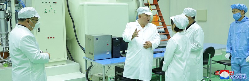 NORTHKOREA-MILITARY/ North Korean leader Kim Jong Un and his daughter Kim Ju Ae meet with members of the Non-permanent Satellite Launch Preparatory Committee, as he inspects the country's first military reconnaissance satellite, in Pyongyang, North Korea May 16, 2023, in this image released by North Korea's Korean Central News Agency on May 17, 2023. KCNA via REUTERS ATTENTION EDITORS - THIS IMAGE WAS PROVIDED BY A THIRD PARTY. REUTERS IS UNABLE TO INDEPENDENTLY VERIFY THIS IMAGE. NO THIRD PARTY SALES. SOUTH KOREA OUT. NO COMMERCIAL OR EDITORIAL SALES IN SOUTH KOREA. IMAGE HAS BEEN DIGITALLY OBSCURED AT SOURCE