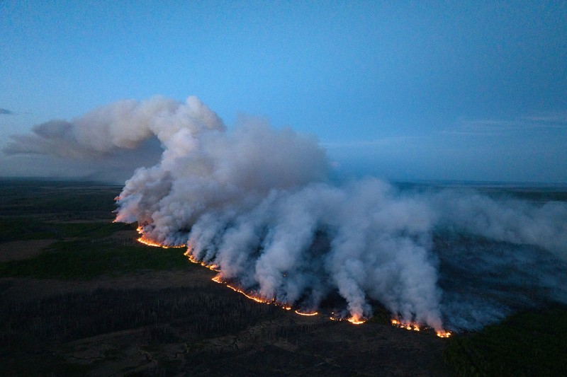 Asap mengepul dari kebakaran Stoddart Creek di dekat Fort St. John, British Columbia, Kanada 13 Mei 2023. Asap mengepul dari kebakaran Stoddart Creek di dekat Fort St. John, British Columbia, Kanada 13 Mei 2023. (B.C.Wildfire Service/Handout via REUTERS)