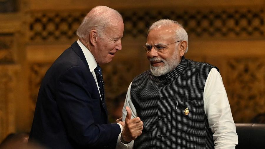 FILE PHOTO: President of the U.S. Joe Biden speaks with Prime Minister of India Narendra Modi at the G20 Summit opening session in Nusa Dua, Bali, Indonesia, Tuesday, Nov. 15, 2022. PRASETYO UTOMO/G20 Media Center/Handout via REUTERS THIS IMAGE HAS BEEN SUPPLIED BY A THIRD PARTY. MANDATORY CREDIT./File Photo