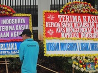 Korban Indosurya Kirim 67 Buket Bunga ke Kejagung & Mahfud MD