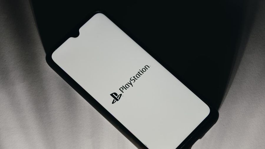 In this photo illustration a PlayStation logo is displayed on a smartphone screen in Athens, Greece on January 20, 2023. (Photo by Nikolas Kokovlis/NurPhoto via Getty Images)