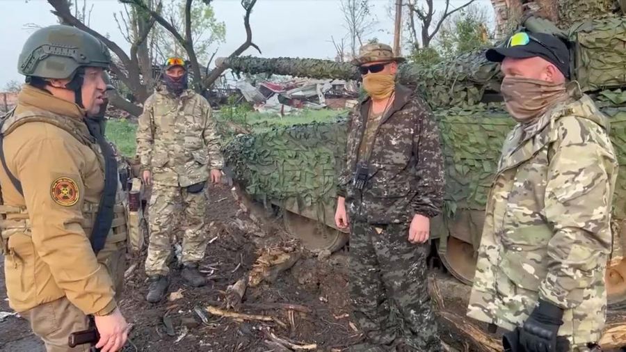 Founder of Wagner private mercenary group Yevgeny Prigozhin talks to Wagner fighters in the course of Russia-Ukraine conflict in Bakhmut, Ukraine, in this still image taken from video released May 25, 2023. Press service of 
