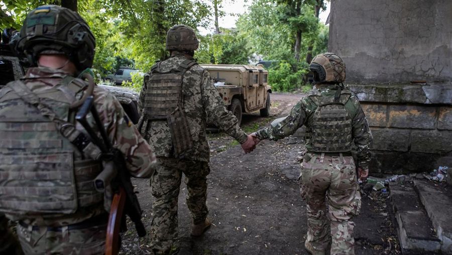 Founder of Wagner private mercenary group Yevgeny Prigozhin talks to Wagner fighters in the course of Russia-Ukraine conflict in Bakhmut, Ukraine, in this still image taken from video released May 25, 2023. Press service of 