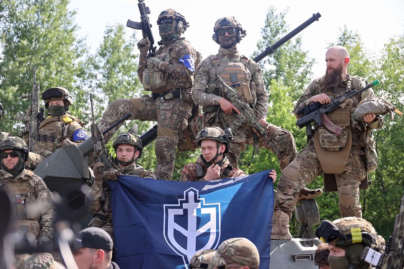 Perwakilan Legiun Kebebasan Rusia dan Korps Sukarelawan Rusia (RDK) mengadakan pengarahan di dekat perbatasan di Ukraina utara. (Future Publishing via Getty Images) Perwakilan Legiun Kebebasan Rusia dan Korps Sukarelawan Rusia (RDK) mengadakan pengarahan di dekat perbatasan di Ukraina utara. (Future Publishing via Getty Images)