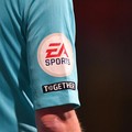 BOLTON, ENGLAND - JANUARY 10: A general view of the EA Sports and Together badges on the assistant referees arm during the Papa John's Trophy Quarter Final match between Bolton Wanderers and Portsmouth at University of Bolton Stadium on January 10, 2