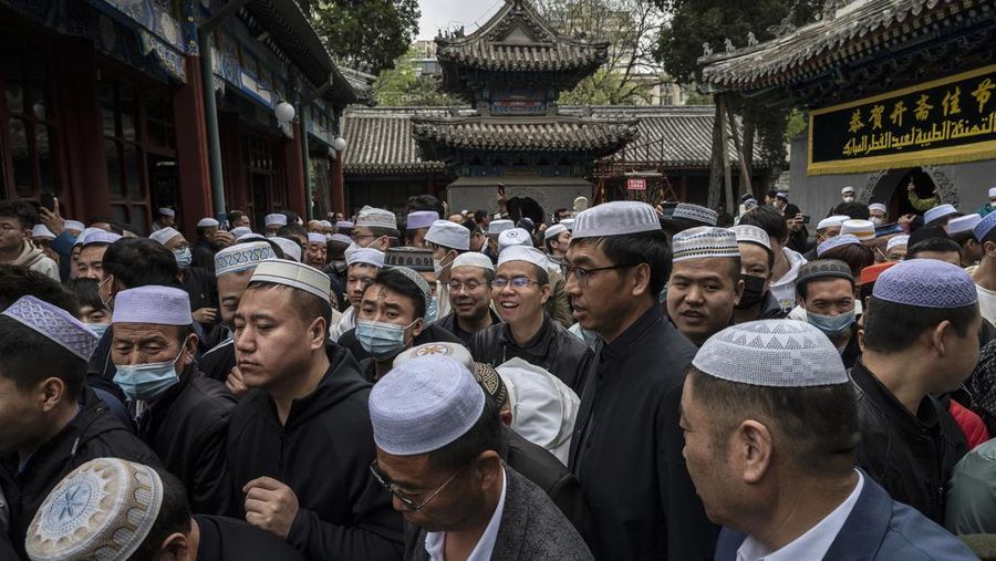 Ilustrasi Muslim Cina. (Photo by Kevin Frayer/Getty Images)