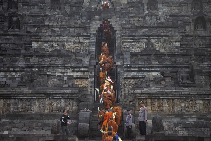 1258353594 Buddhist Monks from are arrive at Borobudur temple in Magelang, Central Java, on June 1, 2023. 32 buddhist monks from Thailand, Malaysia and Indonesia who made a religious journey of more than 2,000 Km (International Thuddong), from Thailand to Indonesia, finished their journey at Borobudur Temple, to further celebrate Vesak Day on June 4. (Photo by Aditya Irawan/NurPhoto via Getty Images)