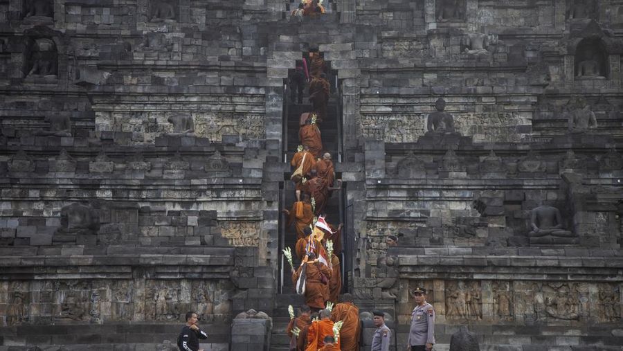 Buddhist Monks from are arrive at Borobudur temple in Magelang, Central Java, on June 1, 2023. 32 buddhist monks from Thailand, Malaysia and Indonesia who made a religious journey of more than 2,000 Km (International Thuddong), from Thailand to Indonesia, finished their journey at Borobudur Temple, to further celebrate Vesak Day on June 4. (Photo by Aditya Irawan/NurPhoto via Getty Images)
