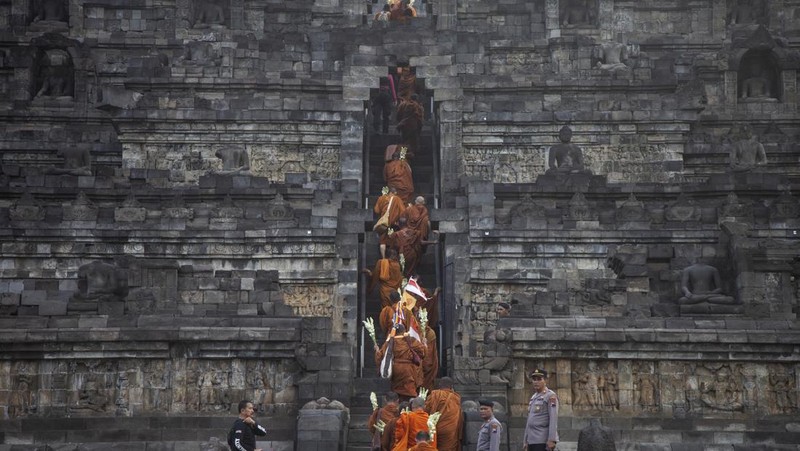 Buddhist Monks from are arrive at Borobudur temple in Magelang, Central Java, on June 1, 2023. 32 buddhist monks from Thailand, Malaysia and Indonesia who made a religious journey of more than 2,000 Km (International Thuddong), from Thailand to Indonesia, finished their journey at Borobudur Temple, to further celebrate Vesak Day on June 4. (Photo by Aditya Irawan/NurPhoto via Getty Images)