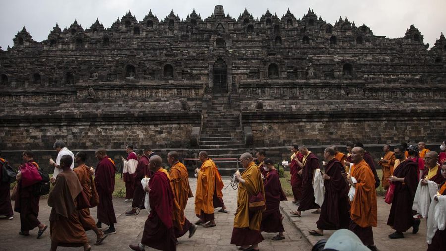 Buddhist monks from Tibet, perform Pradaksina at Borobudur temple in Magelang, Central Java, on June 1, 2023. Buddhist monks from various countries, have arrived at Borobudur Temple to celebrate Vesak day on June 4. (Photo by Aditya Irawan/NurPhoto via Getty Images)