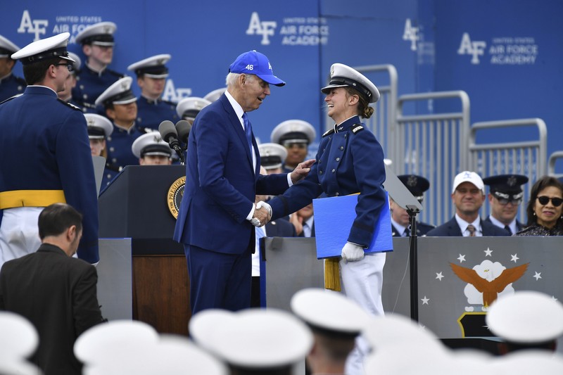 Biden Air Force Graduation A cadet receives her diploma and shakes hands with President Joe Biden during the United States Air Force Academy graduation ceremony, Thursday, June 1, 2023, at Air force Academy, Colo. (AP Photo/John Leyba)