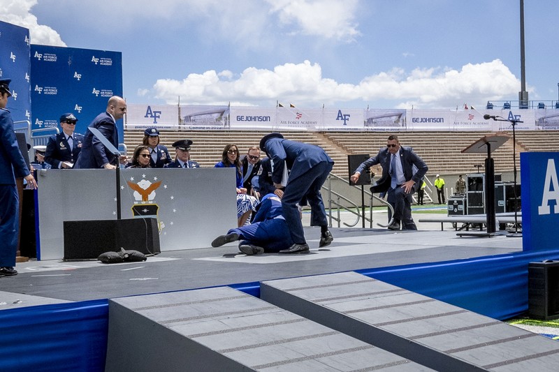 A cadet receives her diploma and shakes hands with President Joe Biden during the United States Air Force Academy graduation ceremony, Thursday, June 1, 2023, at Air force Academy, Colo. (AP Photo/John Leyba)