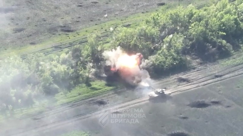 UKRAINE-CRISIS/BAKHMUT View of military vehicles as Ukrainian forces destroy Russian positions in direction of Bakhmut, near Klischiivka, Donetsk Region, Ukraine, in this screengrab taken from a video released on June 4, 2023. 3rd Assault Brigade / Ukrainian Armed Forces Press Service/Handout via REUTERS THIS IMAGE HAS BEEN SUPPLIED BY A THIRD PARTY. MANDATORY CREDIT