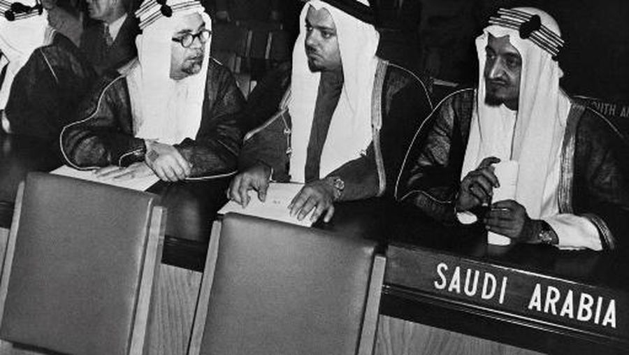 Saudi Arabia diplomat Hafiz Wahba (L), first Saudi ambassador to the United States Sheikh Asad Al-Faqih (C) and King of Saudi Arabia Faisal bin Abdulaziz Al Saud (R) attend a session of the United Nations General Assembly, on November 2, 1946, in New-York. (Photo by AFP)