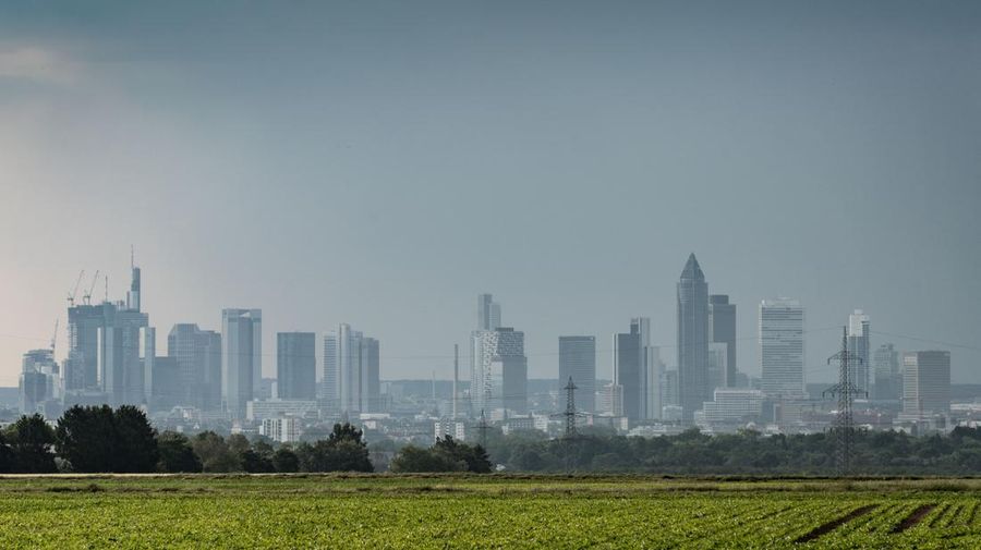 08 June 2023, Hesse, Frankfurt/Main: A thunderstorm passes over Frankfurt's bank towers in the morning, while on the left there are already signs of better weather. Photo: Frank Rumpenhorst/dpa (Photo by Frank Rumpenhorst/picture alliance via Getty Images)