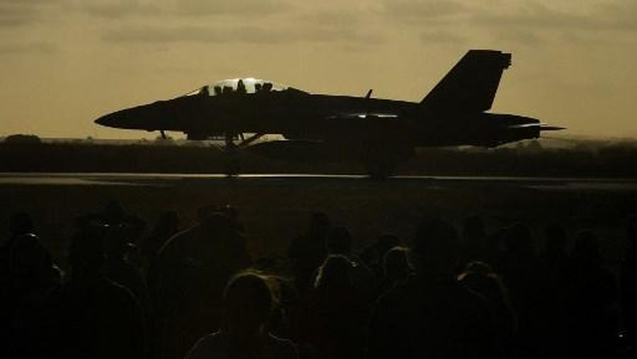 A Royal Australian Air Force F-18 jet fighter prepares to take off for an aerial display during the Australian International Airshow Aerospace and Defence Expo at Avalon Airport in Geelong on March 3, 2023. (Photo by Paul CROCK / AFP)