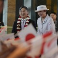 Japan's Emperor Naruhito, left, and Empress Masako talk to Japanese students who greet them upon arrival at their hotel in Jakarta, Indonesia, Saturday, June 17, 2023. The Japanese royals are on a weeklong visit in the country, their first official f