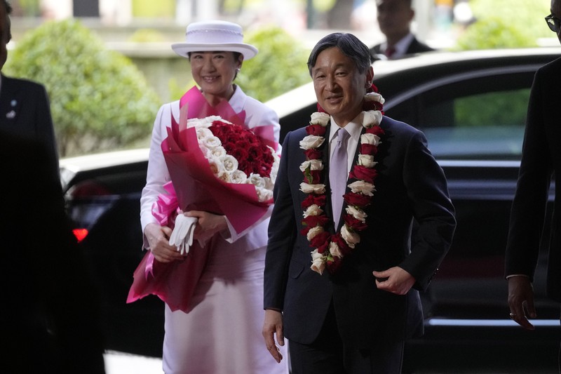 Indonesia Japan Emperor Japanese Emperor Naruhito, left, and Empress Masako , right, upon their arrive at Soekarno-Hatta International Airport in Tangerang, Banten province, Indonesia, Saturday, June 17, 2023. ( Ajeng Dinar Ulfiana/Pool Photo via AP)