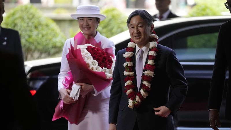 Japanese Emperor Naruhito, left, and Empress Masako , right, upon their arrive at Soekarno-Hatta International Airport in Tangerang, Banten province, Indonesia, Saturday, June 17, 2023. ( Ajeng Dinar Ulfiana/Pool Photo via AP)
