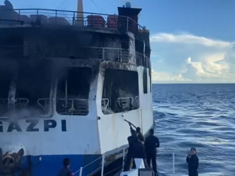 Smoke rises due to a massive fire at a ferry in Bohol, Philippines, June 18, 2023 in this handout image. Philippine Coast Guard/Handout via REUTERS    THIS IMAGE HAS BEEN SUPPLIED BY A THIRD PARTY. NO RESALES. NO ARCHIVES. MANDATORY CREDIT.